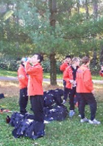 Tech men stretch before a meet.